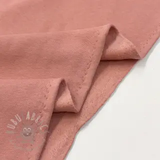 Geruwde sweaterstof faded coral