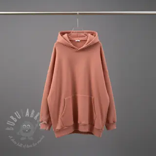 Geruwde sweaterstof faded coral