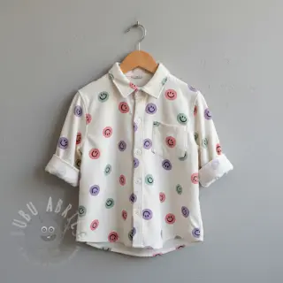Katoenen stof FLANNEL Happy faces off white lilac