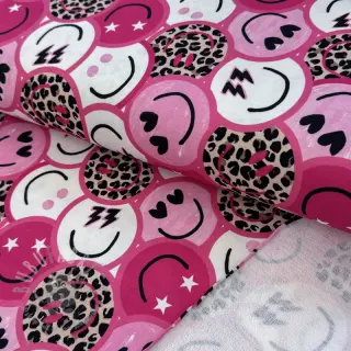 Sweaterstof Happy faces pink digital print